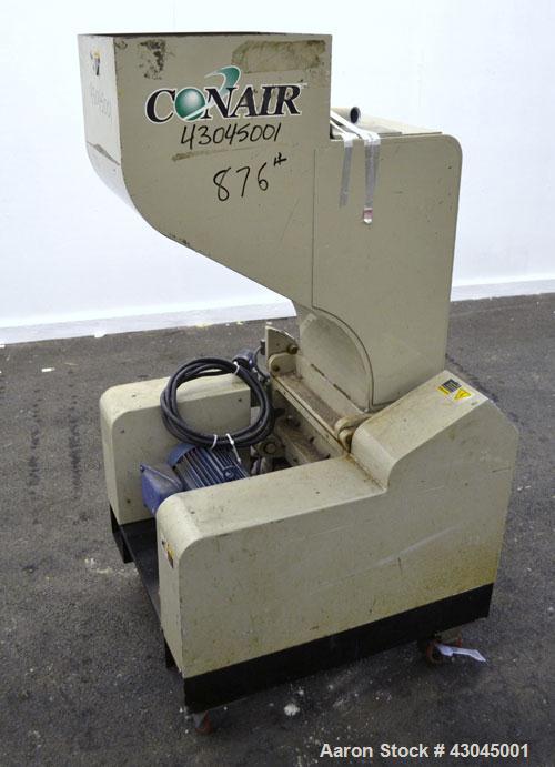 Used Conair Granulator, Model LP-814, Carbon Steel. Involute parabolic segmented helical type rotor with 7 rows of blades. Approximate 13-3/4" x 8" feed with a tilt back hopper. Approximate 1/8’’ dia...