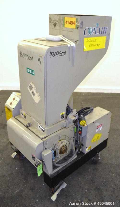 Used Conair Granulator, Model LP-814, Carbon Steel. Involute parabolic segmented helical type rotor with 7 rows of blades. Approximate 13-3/4" x 8" feed with a tilt back hopper. Approximate 1/8’’ dia...