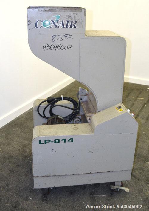 Used Conair Granulator, Model LP-814, Carbon Steel. Involute parabolic segmented helical type rotor with 7 rows of blades. Approximate 13-3/4" x 8" feed with a tilt back hopper. Approximate 1/8’’ dia...