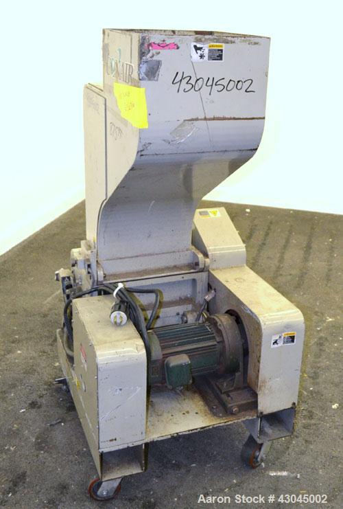 Used Conair Granulator, Model LP-814, Carbon Steel. Involute parabolic segmented helical type rotor with 7 rows of blades. Approximate 13-3/4" x 8" feed with a tilt back hopper. Approximate 1/8’’ dia...