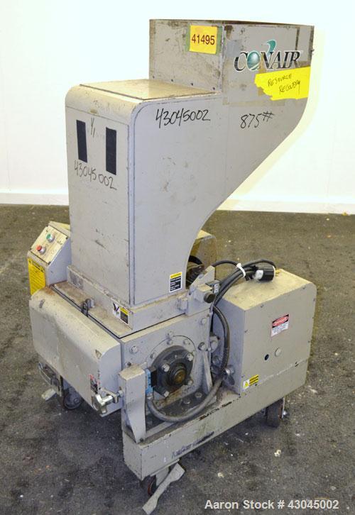 Used Conair Granulator, Model LP-814, Carbon Steel. Involute parabolic segmented helical type rotor with 7 rows of blades. Approximate 13-3/4" x 8" feed with a tilt back hopper. Approximate 1/8’’ dia...