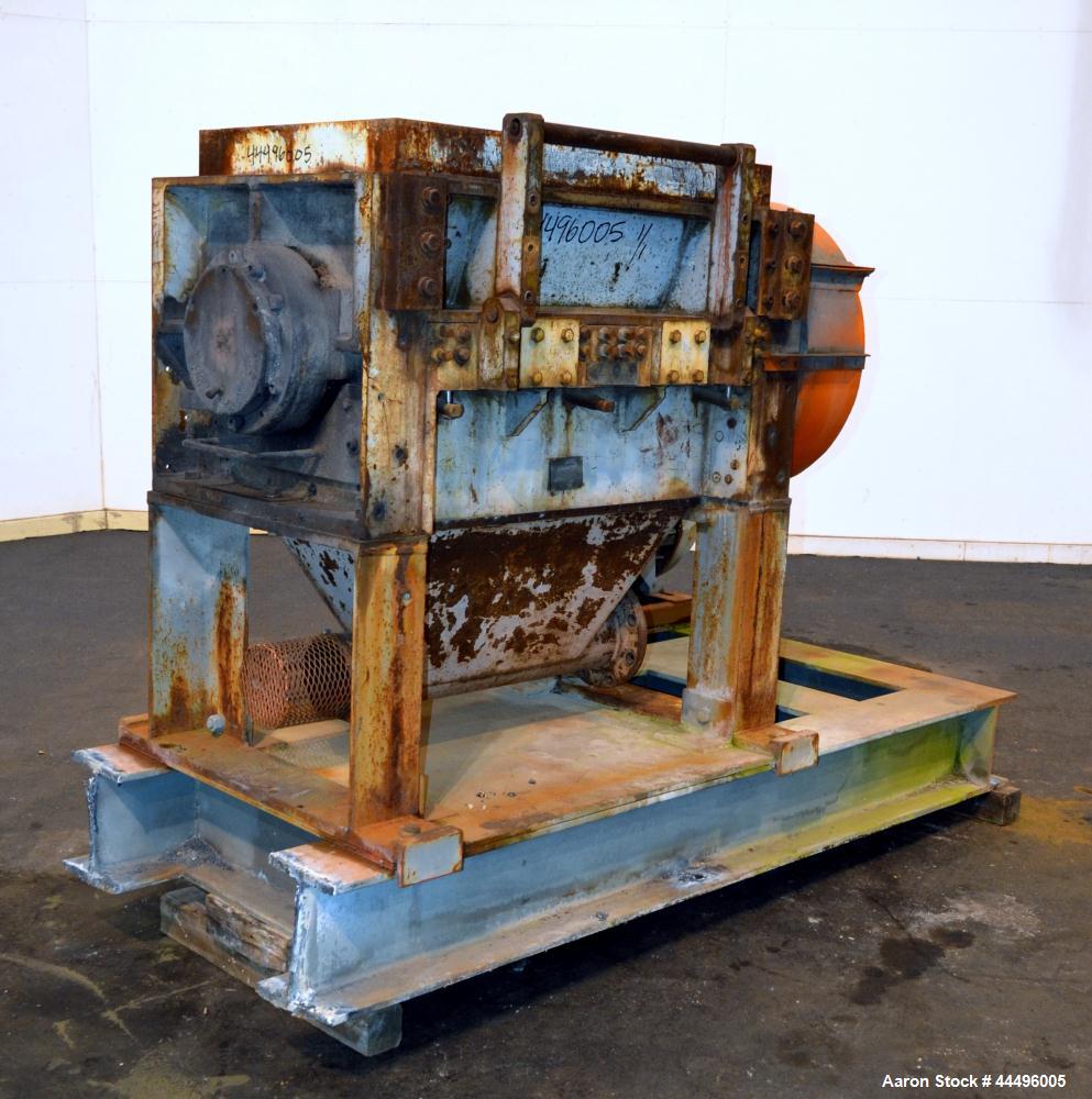 Used Cumberland Granulator, Model 18X37-5KN. Approximate 18" x 37" feed opening, no hopper. Approximate 16" diameter cutting circle with 5 rows of 2 bolt on blades, open rotor, set up for blower bott...