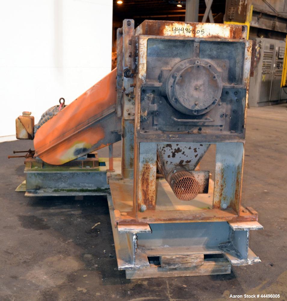 Used Cumberland Granulator, Model 18X37-5KN. Approximate 18" x 37" feed opening, no hopper. Approximate 16" diameter cutting circle with 5 rows of 2 bolt on blades, open rotor, set up for blower bott...