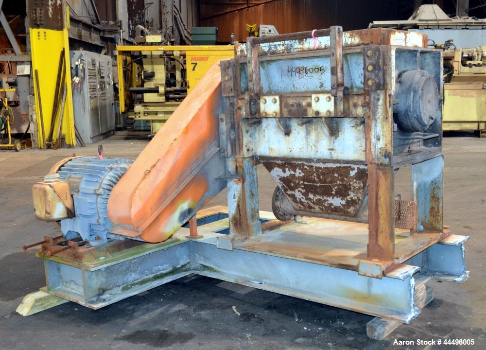 Used Cumberland Granulator, Model 18X37-5KN. Approximate 18" x 37" feed opening, no hopper. Approximate 16" diameter cutting circle with 5 rows of 2 bolt on blades, open rotor, set up for blower bott...