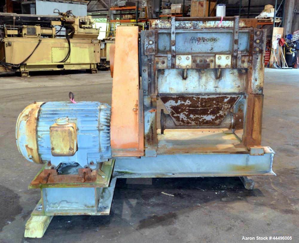 Used Cumberland Granulator, Model 18X37-5KN. Approximate 18" x 37" feed opening, no hopper. Approximate 16" diameter cutting circle with 5 rows of 2 bolt on blades, open rotor, set up for blower bott...