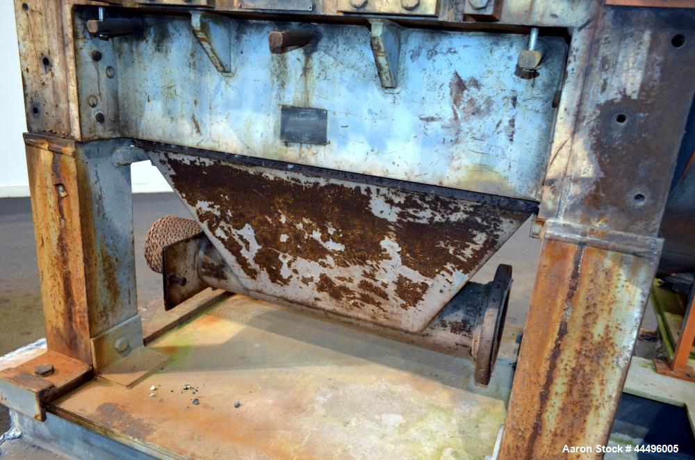 Used Cumberland Granulator, Model 18X37-5KN. Approximate 18" x 37" feed opening, no hopper. Approximate 16" diameter cutting circle with 5 rows of 2 bolt on blades, open rotor, set up for blower bott...