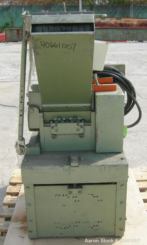 Used Cumberland Granulator, size 1 Gran. 2KN.  Approximate 10" wide 2 bolt on blade, open rotor.  10" x 9" carbon steel chamber.  Tilt back pelican style feed hopper, bottom discharge drawer.  Approx...