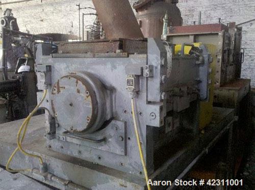 Used Cumberland Granulator, Model 24B. Approximate 14'' x 24'' feed opening with hopper. 3 Knife open rotor, bottom discharge. Driven by a 60 hp, 3/60/230/460 volt motor. Mounted on a base with legs.
