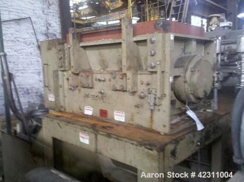 Used Cumberland Granulator, Model 37B. Approximate 21" x 37" feed opening with hopper. 3 Knife open rotor, bottom discharge. Driven by a 150 hp, 3/60/460 volt motor. Mounted on a base with legs.