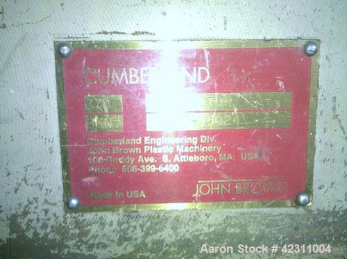 Used Cumberland Granulator, Model 37B. Approximate 21" x 37" feed opening with hopper. 3 Knife open rotor, bottom discharge. Driven by a 150 hp, 3/60/460 volt motor. Mounted on a base with legs.