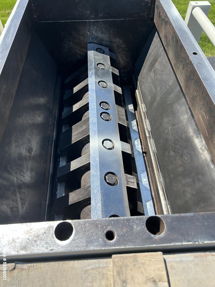 Used Cumberland Model 1837B granulator. 18" x 37" feed throat. 3 knife high shear rotor with two bed knives. Belt driven rotor by a 100 HP,  3/60/230/460 volt, 1775 RPM motor. Tray in-feed hopper. 84...