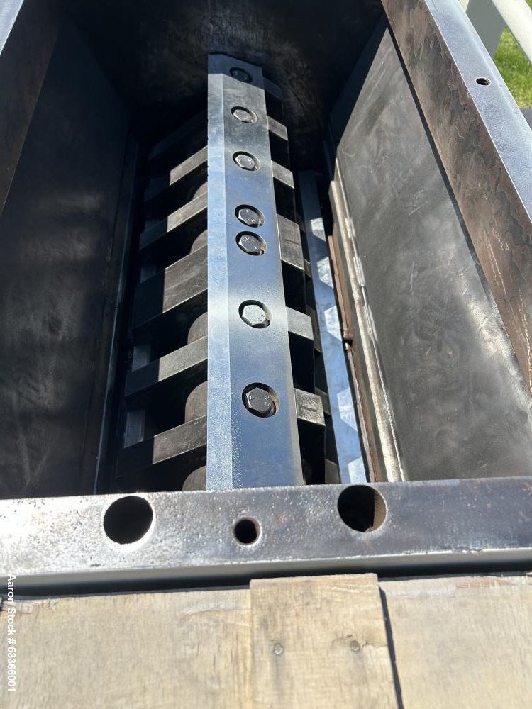 Used Cumberland Model 1837B granulator. 18" x 37" feed throat. 3 knife high shear rotor with two bed knives. Belt driven rotor by a 100 HP,  3/60/230/460 volt, 1775 RPM motor. Tray in-feed hopper. 84...