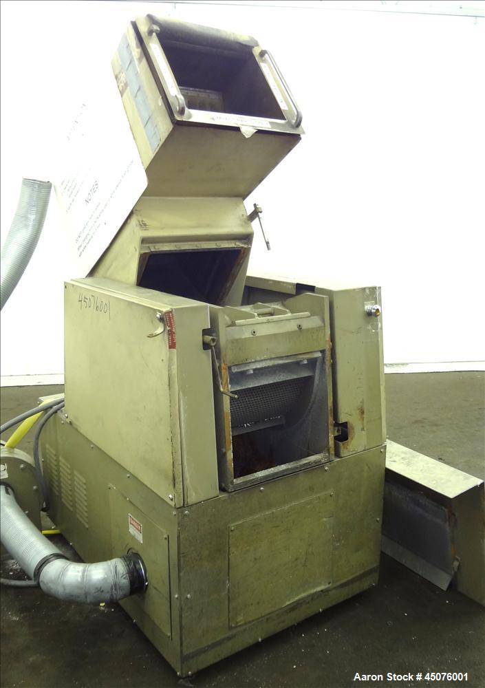 Used Cumberland Granulator, Model 484-3KN. Approximate 16" x 14" feed opening with tilt back pelican hopper. 3 Bolt on blade open rotor, set up for blower bottom discharge. Driven by a 15hp, 3/60/208...