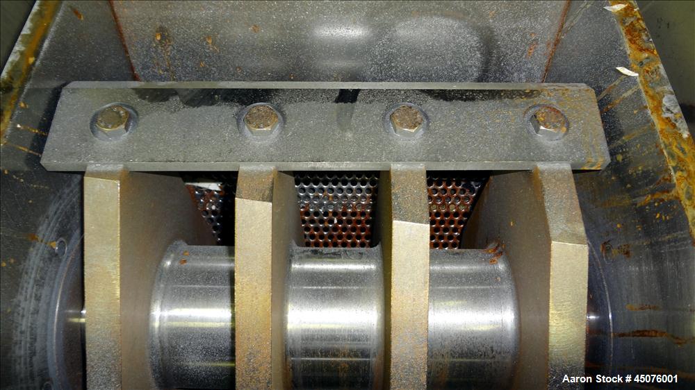 Used Cumberland Granulator, Model 484-3KN. Approximate 16" x 14" feed opening with tilt back pelican hopper. 3 Bolt on blade open rotor, set up for blower bottom discharge. Driven by a 15hp, 3/60/208...