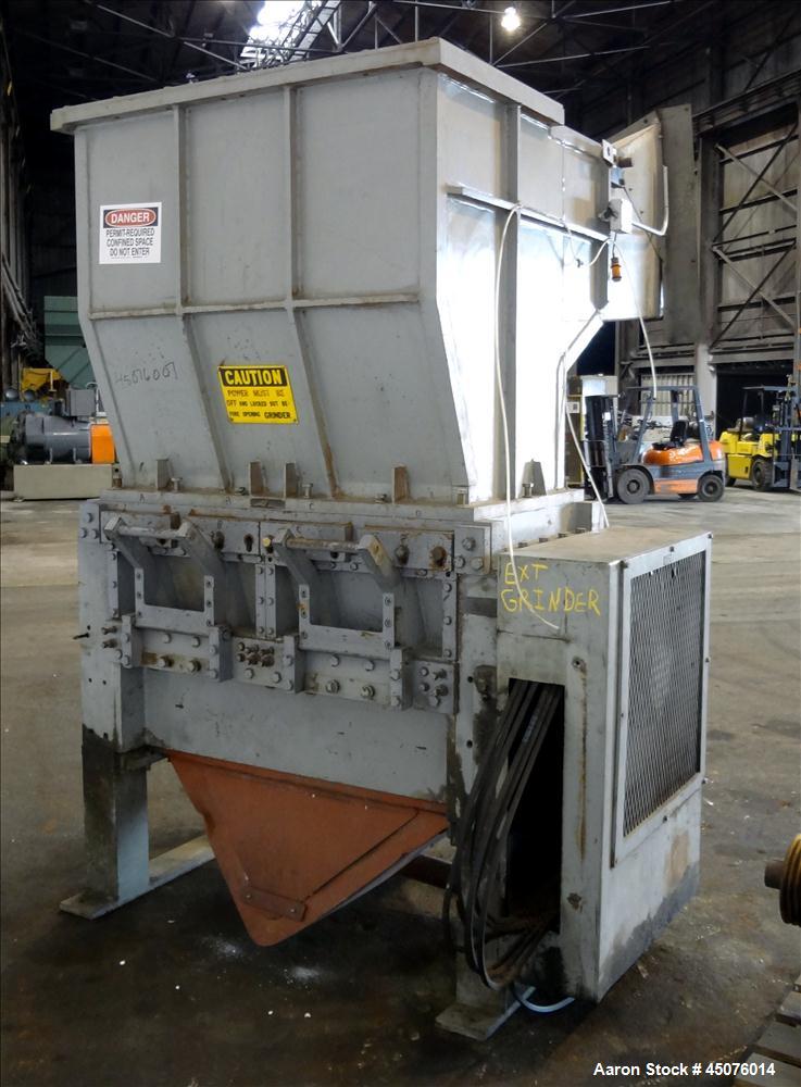 Used Cumberland Granulator, Model 50 Gran. 7KN. Approximate 50" x 25" feed opening with a bolt on hopper. Approximate 25" diameter cutting circle with 7 rows of 2 bolt on blades, open rotor, set up f...