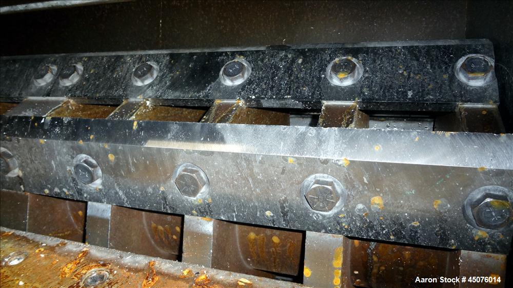 Used Cumberland Granulator, Model 50 Gran. 7KN. Approximate 50" x 25" feed opening with a bolt on hopper. Approximate 25" diameter cutting circle with 7 rows of 2 bolt on blades, open rotor, set up f...
