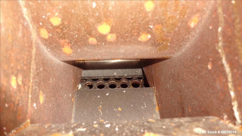 Used Cumberland Granulator, Model 50 Gran. 7KN. Approximate 50" x 25" feed opening with a bolt on hopper. Approximate 25" diameter cutting circle with 7 rows of 2 bolt on blades, open rotor, set up f...