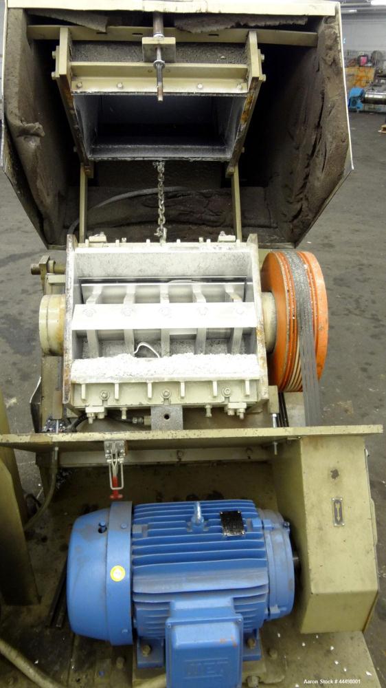 Used Cumberland Granulator, Model 585-3KN.  Approximately 20” x 14” feed opening with tilt back feed hopper. Approximately 12” diameter x 20” wide (3) bolt on blade open rotor.  Bottom discharge with...