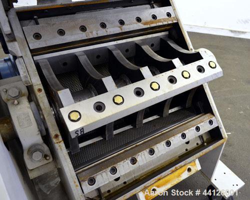 Used Cumberland Grinder, Model G1624, Carbon Steel. Approximately 16” x 24” feed opening with a manual tilt back pelican style feed hopper. 3 Bolt-on blade open rotor, (2) bed knives. Approximately 1...