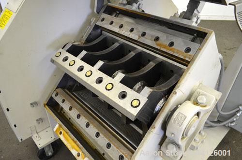 Used Cumberland Grinder, Model G1624, Carbon Steel. Approximately 16” x 24” feed opening with a manual tilt back pelican style feed hopper. 3 Bolt-on blade open rotor, (2) bed knives. Approximately 1...