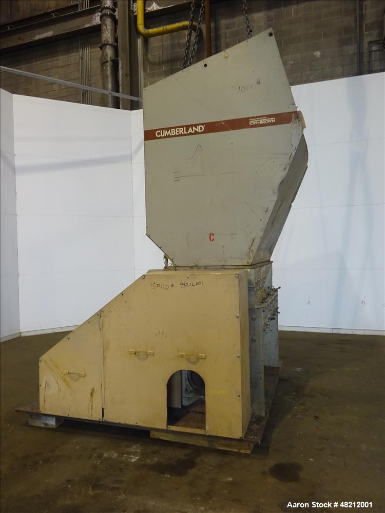 Used Cumberland X-Series  Granulator,  Model X1400. Approximate 24" x 56" feed throat with a tilting feed hopper. 5 Knife twin shear / high shear rotor, 2 bed knife, belt driven by a 150 hp 3/60/460 ...