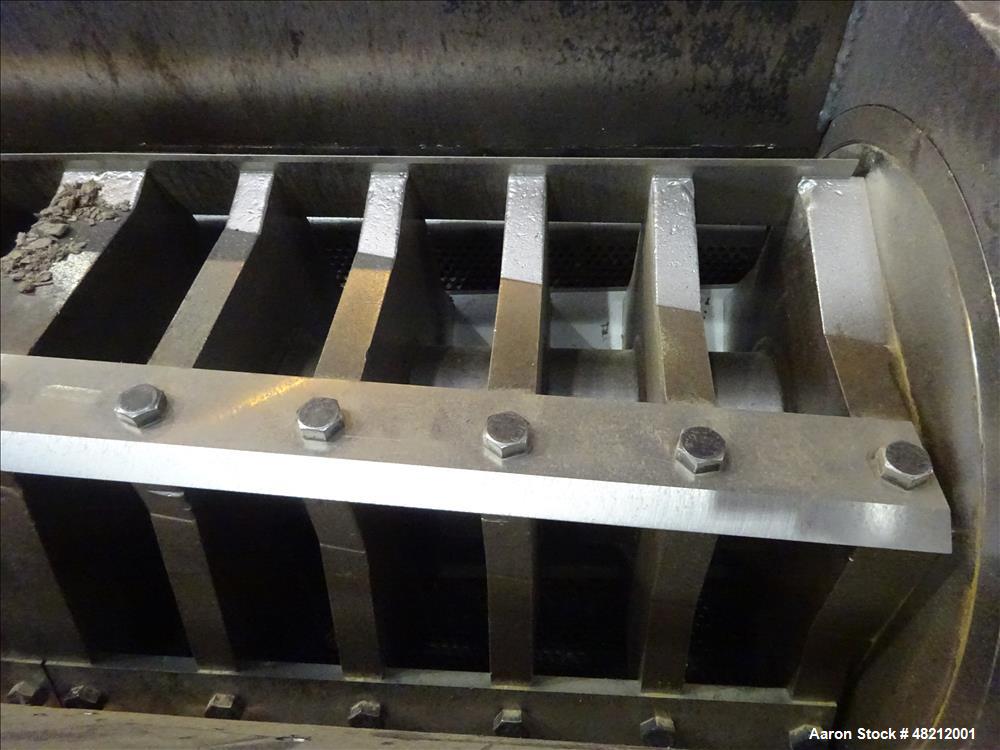 Used Cumberland X-Series  Granulator,  Model X1400. Approximate 24" x 56" feed throat with a tilting feed hopper. 5 Knife twin shear / high shear rotor, 2 bed knife, belt driven by a 150 hp 3/60/460 ...