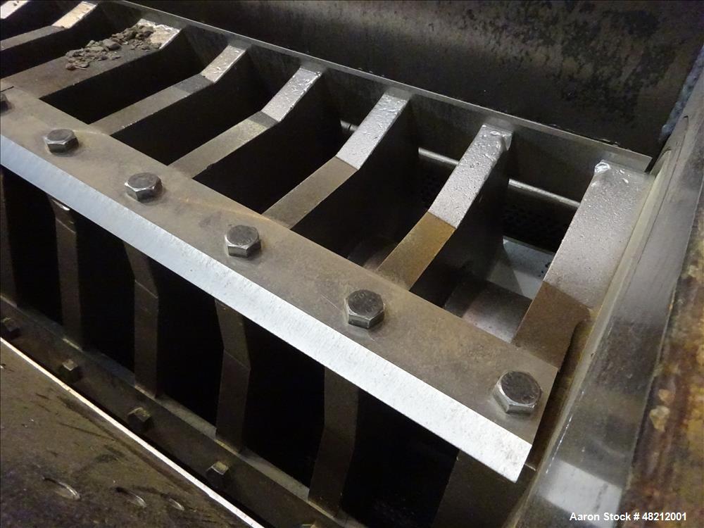 Used Cumberland X-Series  Granulator,  Model X1400. Approximate 24" x 56" feed throat with a tilting feed hopper. 5 Knife twin shear / high shear rotor, 2 bed knife, belt driven by a 150 hp 3/60/460 ...
