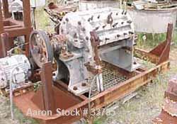 USED: Cumberland grinder, carbon steel. 5 hp, 3/60/220/440 volt, 1150 rpm motor, cutting rotor 26" wide x 16" diameter, 6 fixed,carbon steel blades with stainless steel tips, no cover.