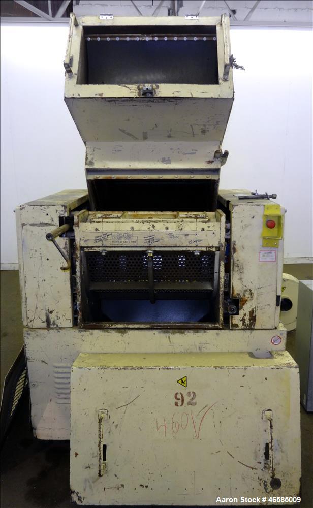 Used Grinder, Carbon Steel. Approximate 15" x 26" wide feed opening with tilt back pelican feed hopper. (3) bolt on tip blades, open rotor. Driven by a 75 hp, 3/60/230/460 volt, 1775 rpm motor. 1/2" ...