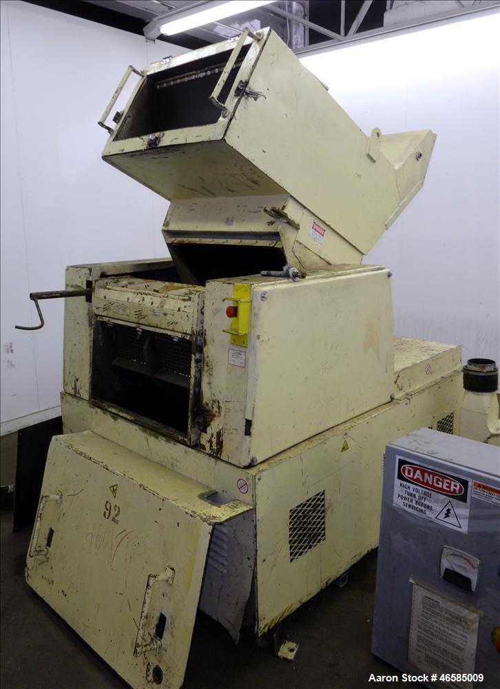 Used Grinder, Carbon Steel. Approximate 15" x 26" wide feed opening with tilt back pelican feed hopper. (3) bolt on tip blades, open rotor. Driven by a 75 hp, 3/60/230/460 volt, 1775 rpm motor. 1/2" ...