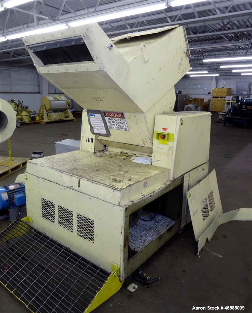 Used Grinder, Carbon Steel. Approximate 15" x 26" wide feed opening with tilt back pelican feed hopper. (3) bolt on tip blades, open rotor. Driven by a 75 hp, 3/60/230/460 volt, 1775 rpm motor. 1/2" ...