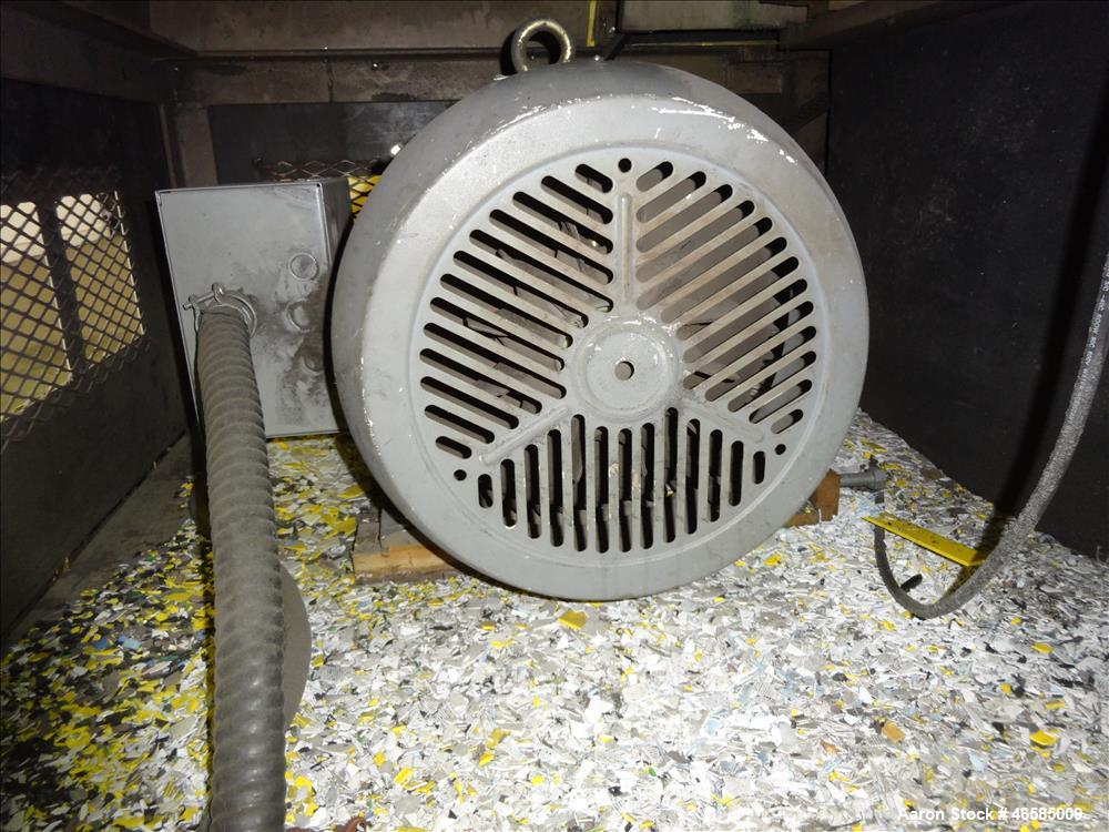 Used Grinder, Carbon Steel. Approximate 15" x 26" wide feed opening with tilt back pelican feed hopper. (3) bolt on tip blades, open rotor. Driven by a 75 hp, 3/60/230/460 volt, 1775 rpm motor. 1/2" ...