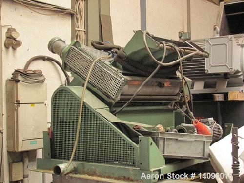 Used Dreher StG 26/82 Skeletal Waste Granulator with roller intake for thermoforming film.  10 Hp (7.5 kW) motor.  Feed opening 32.2" x 15.7" (820 x 400 mm).  (4) Rotor knives.  (2) Stator knives.  R...