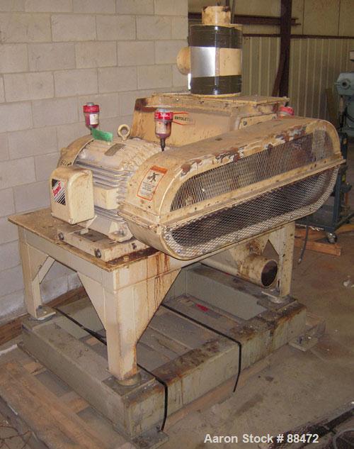 Used Entoleter Film Grinder, Model 1530F. Approximate 15" diameter x 30" wide 7 blade open rotor. Approximately 8" x 30" feed throat with a film hopper, set up for bottom blower discharge. Approximat...