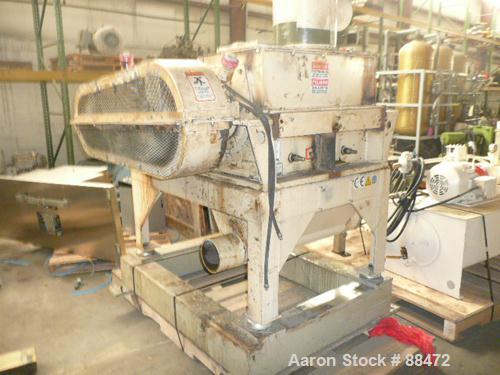 Used Entoleter Film Grinder, Model 1530F. Approximate 15" diameter x 30" wide 7 blade open rotor. Approximately 8" x 30" feed throat with a film hopper, set up for bottom blower discharge. Approximat...