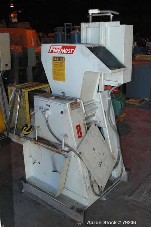 USED: Foremost grinder, model 3E1. 12" wide, 4 bolt-on blade openrotor. 2 bed knives, pelican feed hopper, approx 1/8" diameter screenholes, set up for bottom blower discharge with 5 hp, 3505 rpm,3/6...