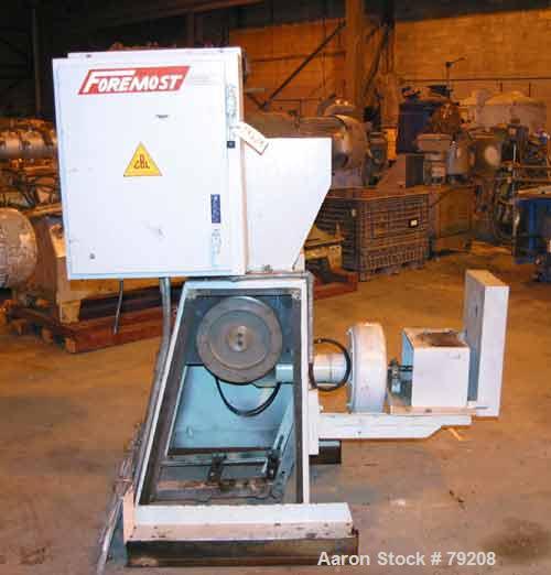 Used Foremost Grinder, Model 3E1. 12" wide 4 bolt-on blade open rotor, 2 bed knives, pelican feed, approximate 1/8" diameter screen holes, set up for bottom blower discharge. Requires an approximate ...