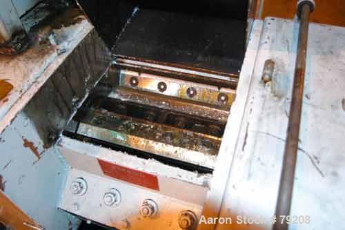 Used Foremost Grinder, Model 3E1. 12" wide 4 bolt-on blade open rotor, 2 bed knives, pelican feed, approximate 1/8" diameter screen holes, set up for bottom blower discharge. Requires an approximate ...