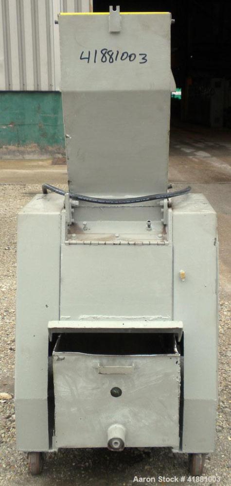 Used Foremost Grinder, Model HD2H. Approximate 14" long solid rotor with a bolt on blade. Tilt back pelican feed hopper. Driven by a 10 hp, 3/50/60/208-220/440 volt, 1500/1800 rpm motor. Includes a b...