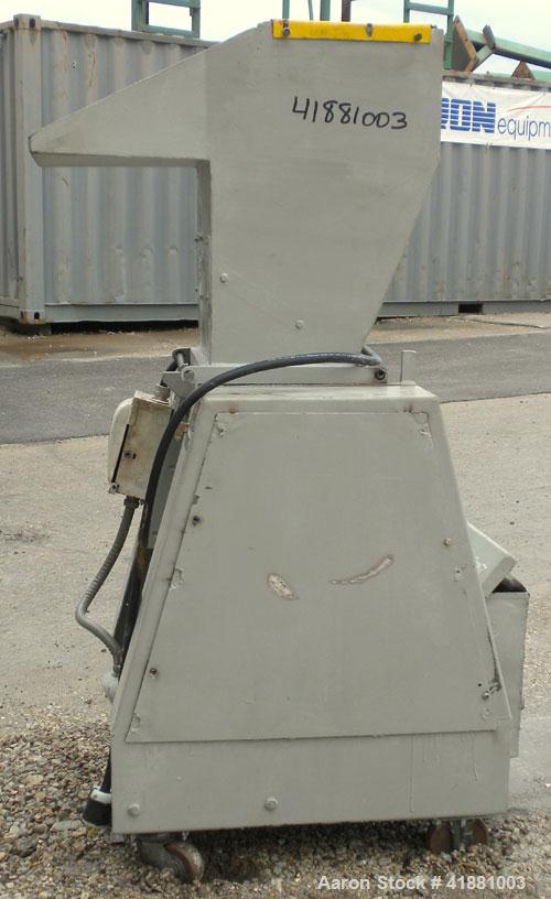 Used Foremost Grinder, Model HD2H. Approximate 14" long solid rotor with a bolt on blade. Tilt back pelican feed hopper. Driven by a 10 hp, 3/50/60/208-220/440 volt, 1500/1800 rpm motor. Includes a b...