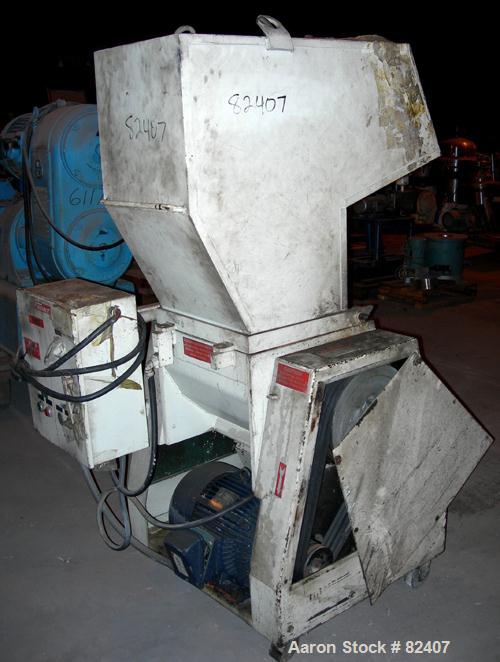 USED: Foremost grinder, model SHD6, approximately 12" diameter x 18" wide 2 bolt-on blade open rotor, (2) bed knives. Tilt forward pelican style feed hopper, bottom discharge drawer. Approximately 3/...