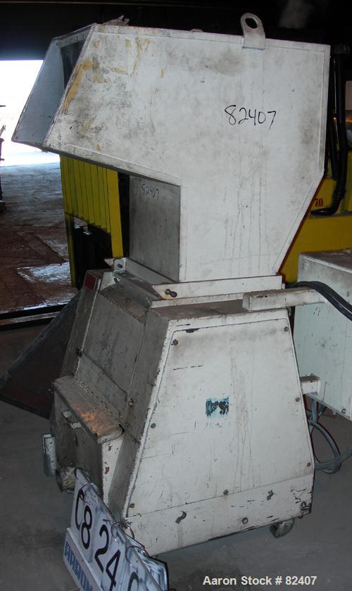 USED: Foremost grinder, model SHD6, approximately 12" diameter x 18" wide 2 bolt-on blade open rotor, (2) bed knives. Tilt forward pelican style feed hopper, bottom discharge drawer. Approximately 3/...