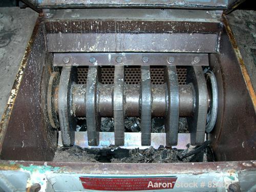 USED: Foremost grinder, model SHD6, approximately 12" diameter x 18" wide 2 bolt-on blade open rotor, (2) bed knives. Tilt forward pelican style feed hopper, bottom discharge drawer. Approximately 3/...