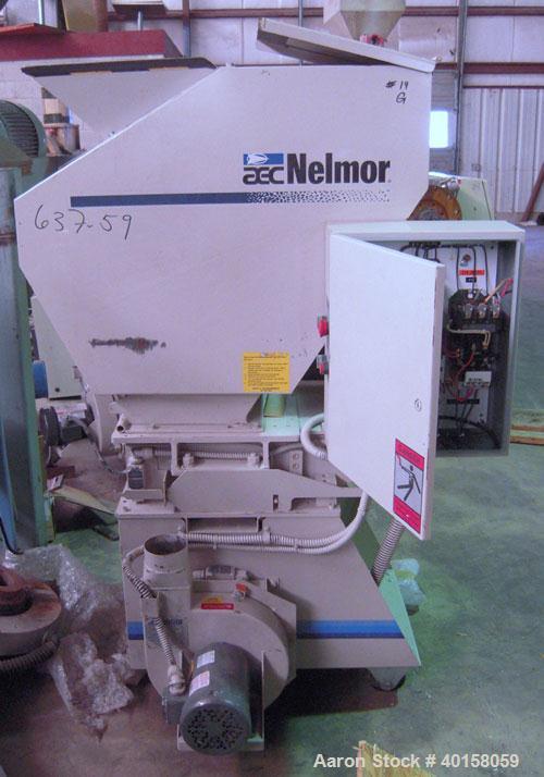 Used Nelmore Granulator, model G1012FX. 10" X 12" feed throat with standard tray feed hopper. Includes 7.5 hp belt driven motor, operator control  panel, blower discharge, cyclone and cyclone base fo...