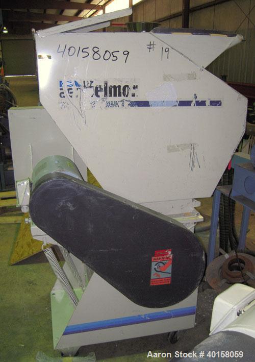 Used Nelmore Granulator, model G1012FX. 10" X 12" feed throat with standard tray feed hopper. Includes 7.5 hp belt driven motor, operator control  panel, blower discharge, cyclone and cyclone base fo...