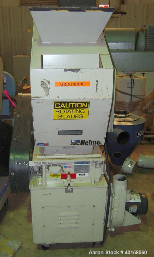 Used Nelmore Granulator, model G1012FX. 10" X 12" feed throat with standard tray feed hopper. Includes 7.5 hp belt driven motor, operator control panel, blower discharge, cyclone and cyclone base for...
