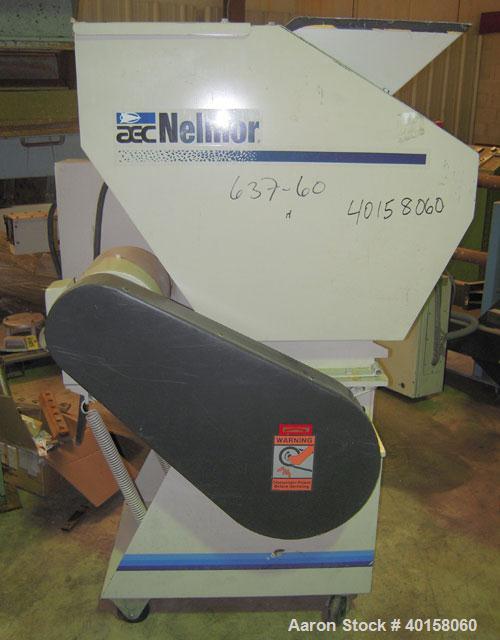 Used Nelmore Granulator, model G1012FX. 10" X 12" feed throat with standard tray feed hopper. Includes 7.5 hp belt driven motor, operator control panel, blower discharge, cyclone and cyclone base for...