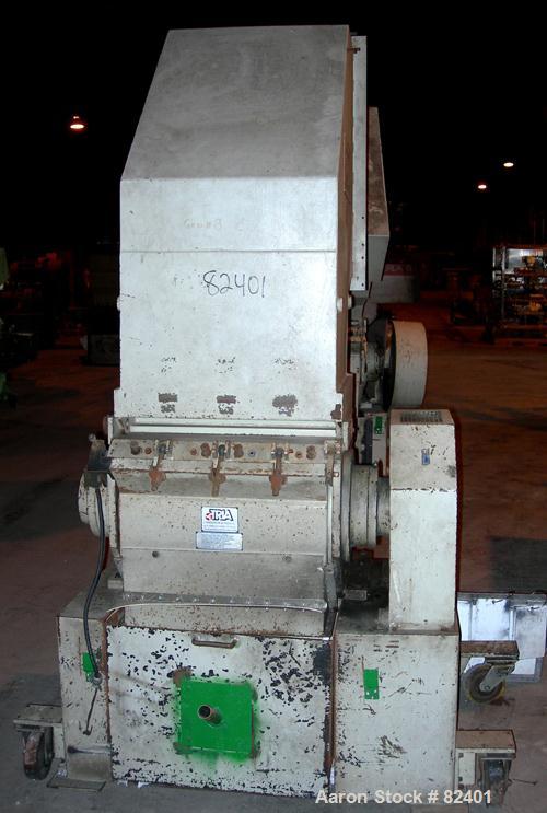 USED: Hamilton/Tria grinder, model 60-35-TD. Approximately 12" diameter x 24" wide 6 bolt-on staggered blades, open rotor, (...