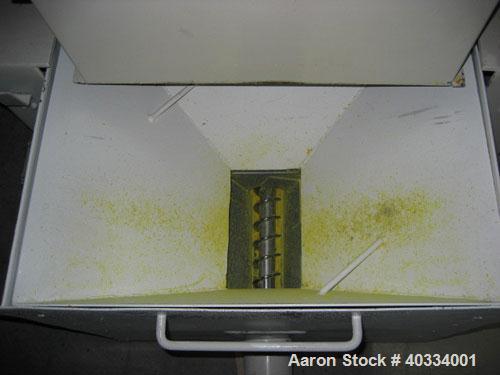 Used Hamilton/Tria Grinder, model 60-35TD. Approximate 12" diameter x 24" wide 3 bolt on blade open rotor, (2) bed knives. Tilt back pelican style feed hopper, bottom discharge drawer. Approximate 3/...