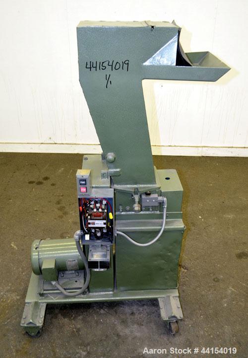 Used IMS Plastic Grinder, Model M-3, Carbon Steel. Approximate 6" diameter x 7" wide feed opening with a tilt back pelican feed hopper. (2) Bolt on blade closed rotor, approximate 3/16" diameter scre...
